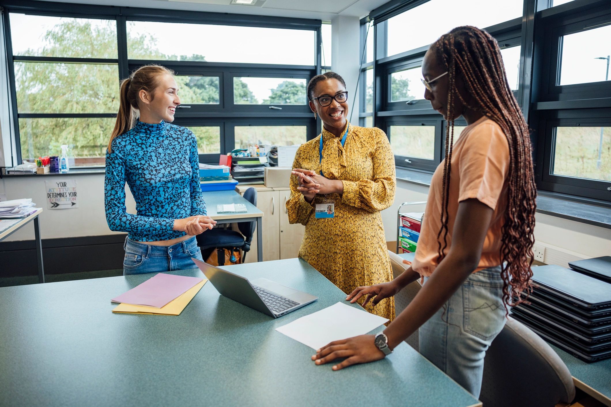 Teacher supporting students in class