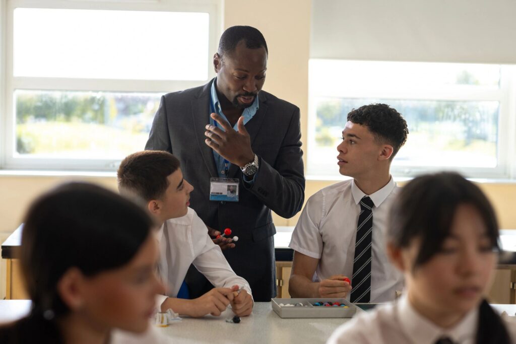 Teacher Educating Students